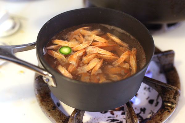 Making the shrimp broth with a bit of serrano.