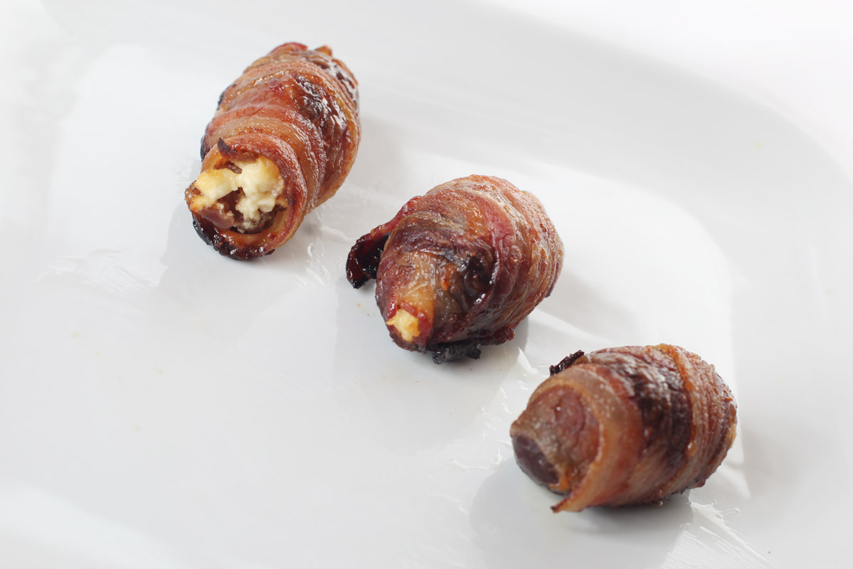 Three dates, wrapped in bacon, stuffed with feta